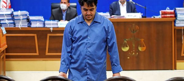 Ruhollah Zam, a dissident journalist who was captured in what Tehran calls an intelligence operation, is seen during his trial in Tehran, Iran June 2, 2020. Picture taken June 2, 2020. - Sputnik International