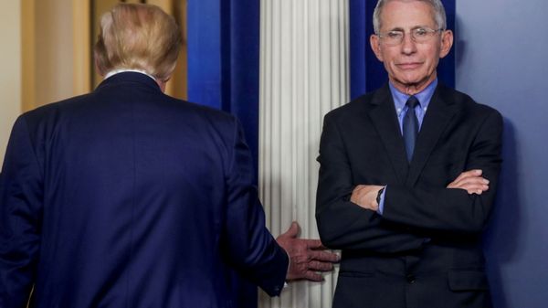 U.S. President Donald Trump departs after addressing the coronavirus task force daily briefing as Dr. Anthony Fauci, director of the National Institute of Allergy and Infectious Diseases, stands by at the White House in Washington, U.S., March 26, 2020. - Sputnik International