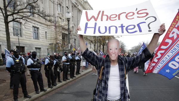 A supporter of President Donald Trump dressed as Joe Biden participates in a demonstration in Freedom Square in Washington, Saturday, December 12, 2020 A supporter of President Donald Trump dressed as Joe Biden participates in a demonstration in Freedom Square in Washington, Saturday, December 12, 2020 - Sputnik International