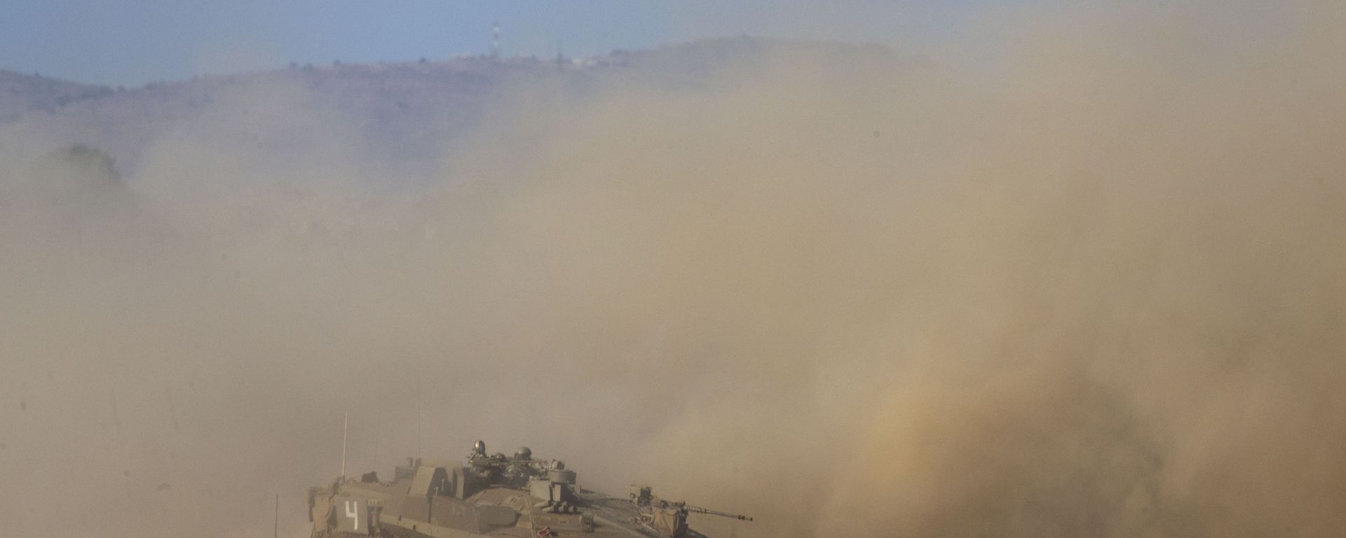 Israeli soldiers drive a tank during an exercise in the Israeli controlled Golan Heights near the border with Syria, Tuesday, Aug. 4, 2020 - Sputnik International, 1920, 20.09.2023