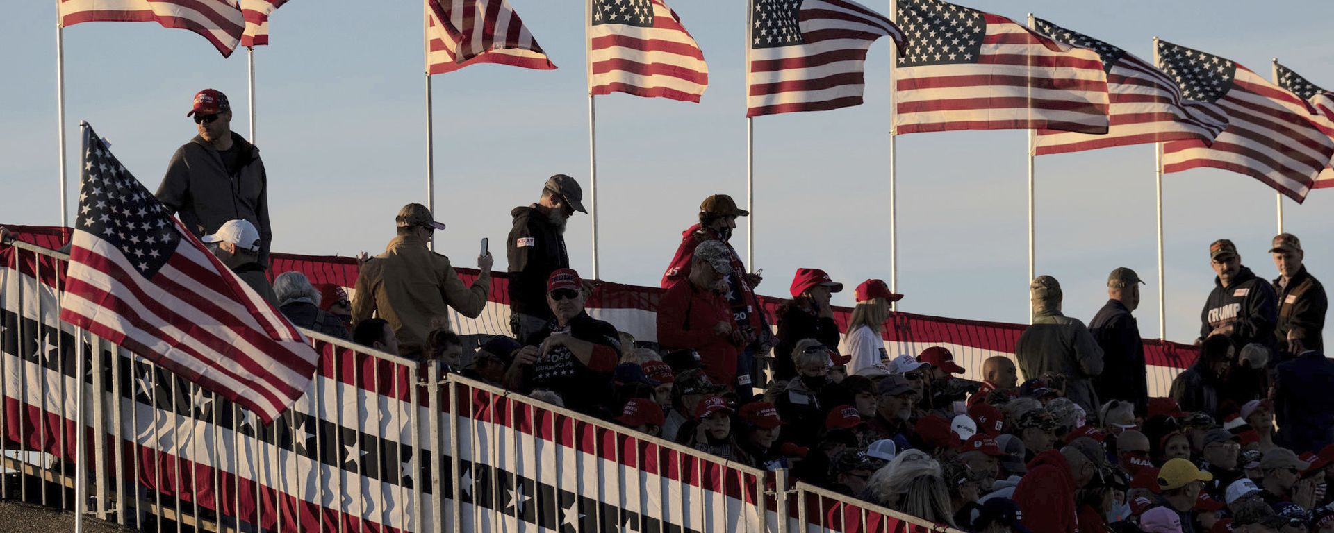 In this Dec. 5, 2020, file photo crowds wait for the start of a rally featuring President Donald Trump for U.S. Senators Kelly Loeffler, R-Ga., and David Perdue, R-Ga., who are both facing runoff elections in Valdosta, Ga. Many Republican voters in Georgia are angry - Sputnik International, 1920, 30.12.2020