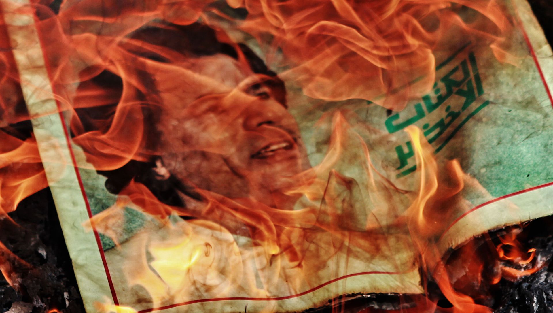 Portrait of Muammar Gaddafi on fire Portrait of Muammar Gaddafi on fire - Sputnik International, 1920, 15.02.2021