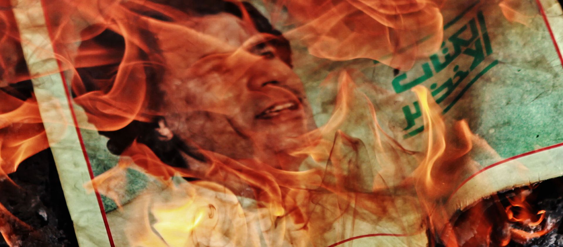 Portrait of Muammar Gaddafi on fire Portrait of Muammar Gaddafi on fire - Sputnik International, 1920, 15.02.2021