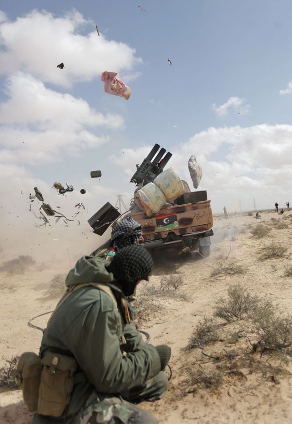 Libyan rebel during shelling of Muammar Gaddafi's army in Libya Libyan rebel during shelling of Muammar Gaddafi's army in Libya - Sputnik International
