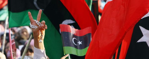 A Libyan flashes the V sign to celebrate at Saha Kish Square in Benghazi, Libya, 23 October 2011 as Libya's transitional government declares the liberation of Libya after months of bloodshed that culminated in the death of longtime leader Moammar Gaddafi. A Libyan flashes the V sign to celebrate at Saha Kish Square in Benghazi, Libya, 23 October 2011 as Libya's transitional government declares the liberation of Libya after months of bloodshed that culminated in the death of longtime leader Moammar Gaddafi. - Sputnik International