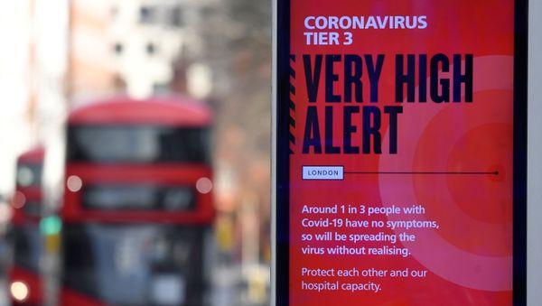 A British government health information advertisement highlighting new restrictions amid the spread of the coronavirus disease (COVID-19) is seen in London, Britain, 19 December 2020. A British government health information advertisement highlighting new restrictions amid the spread of the coronavirus disease (COVID-19) is seen in London, Britain, 19 December 2020. - Sputnik International