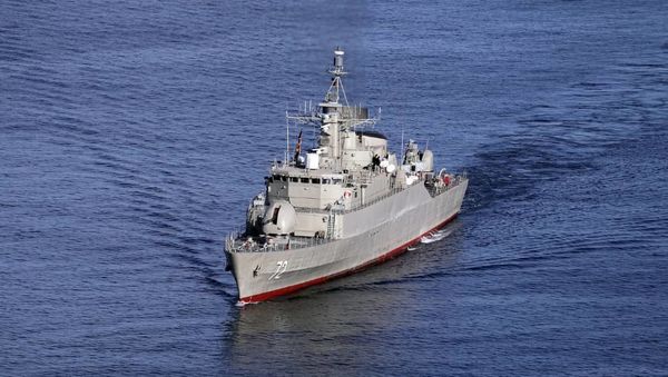 A handout photo made available by the Iranian Army office on December 28, 2019 shows a view of the Islamic Republic of Iran Navy frigate ALBORZ during Iran-Russia-China joint naval drills in the Indian Ocean and the Gulf of Oman. - Sputnik International