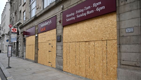 The boarded-up front of a Sainsbury's Local supermarket is pictured on Fleet Street in central London on May 3, 2020, during the nationwide lockdown due to the novel coronavirus COVID-19 pandemic. - Sputnik International