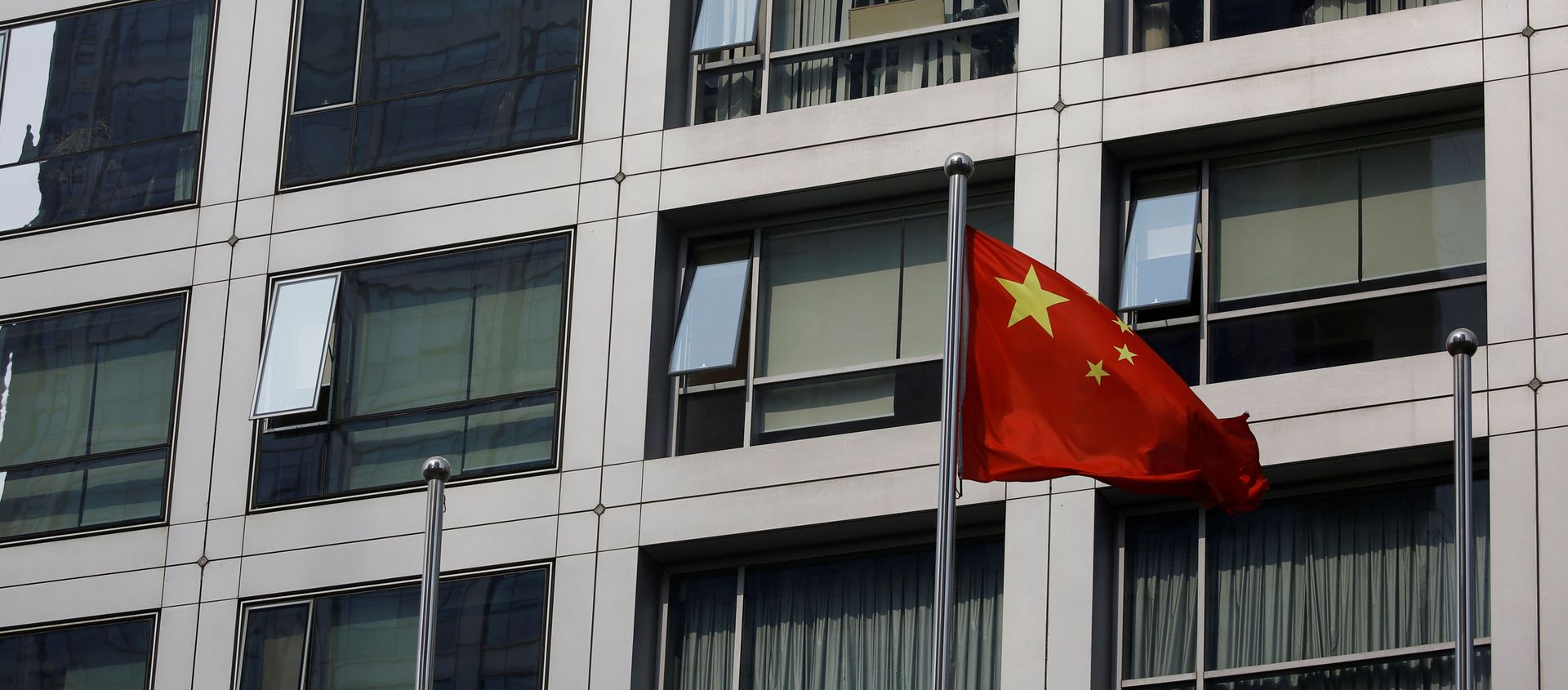 A Chinese national flag flutters near the building of China Securities Regulatory Commission (CSRC) at the Financial Street area in Beijing, China July 16, 2020. A Chinese national flag flutters near the building of China Securities Regulatory Commission (CSRC) at the Financial Street area in Beijing, China July 16, 2020. - Sputnik International, 1920, 18.01.2021