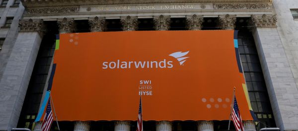 SolarWinds Corp banner hangs at the New York Stock Exchange (NYSE) on the IPO day of the company in New York, U.S., October 19, 2018 - Sputnik International