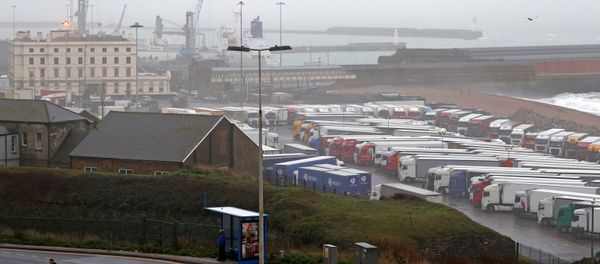 Freight lorries and goods vehicles are pictured parked in a paring lot near the Port of Dover in in Dover, Kent, on the south east coast of England on December 21, 2020 Freight lorries and goods vehicles are pictured parked in a paring lot near the Port of Dover in in Dover, Kent, on the south east coast of England on December 21, 2020 - Sputnik International
