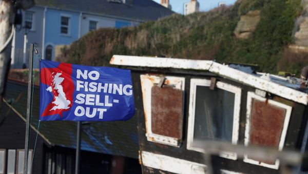 A flag with a slogan supporting the UK fishing industry is seen on the beach in Hastings, Britain, 20 December 2020.  - Sputnik International