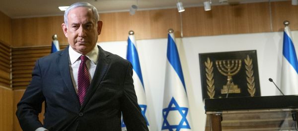 Israeli Prime Minister Benjamin Netanyahu walks after he delivered a statement at the Knesset (Israel's parliament) in Jerusalem, December 22, 2020 Israeli Prime Minister Benjamin Netanyahu walks after he delivered a statement at the Knesset (Israel's parliament) in Jerusalem, December 22, 2020 - Sputnik International