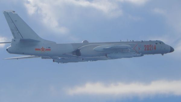 A People's Liberation Army (PLA) H-6 bomber flies on a mission near the median line in the Taiwan Strait, which serves as an unofficial buffer between China and Taiwan, September 18, 2020. - Sputnik International