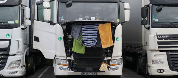 Clothes and towels hang to dry on a lorry at Ashford International Truck Stop, as EU countries impose a travel ban from the UK after the coronavirus disease (COVID-19) outbreak, in Ashford, Britain Clothes and towels hang to dry on a lorry at Ashford International Truck Stop, as EU countries impose a travel ban from the UK after the coronavirus disease (COVID-19) outbreak, in Ashford, Britain - Sputnik International