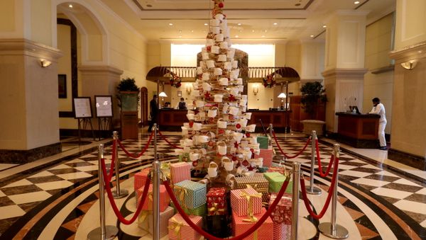 A Christmas tree is decorated with face masks inside a hotel lobby to create awareness about wearing a mask during the coronavirus disease (COVID-19) outbreak, ahead of Christmas celebrations, in Mumbai - Sputnik International
