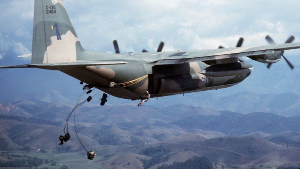 Brazilian paratroopers jump from a 50th Tactical Airlift Squadron C-130E Hercules aircraft - Sputnik International