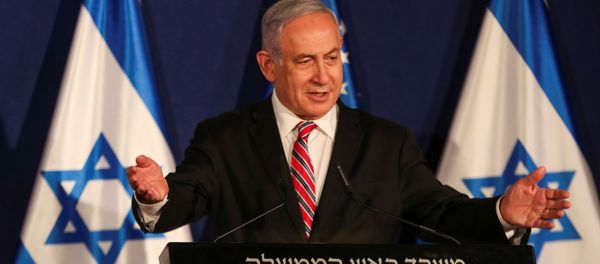 Israeli Prime Minister Benjamin Netanyahu speaks during a news conference with White House senior adviser Jared Kushner (not pictured), in Jerusalem December 21, 2020. - Sputnik International