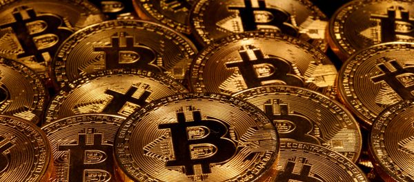 Representations of virtual currency Bitcoin are seen in this illustration taken taken 13 March 2020. - Sputnik International