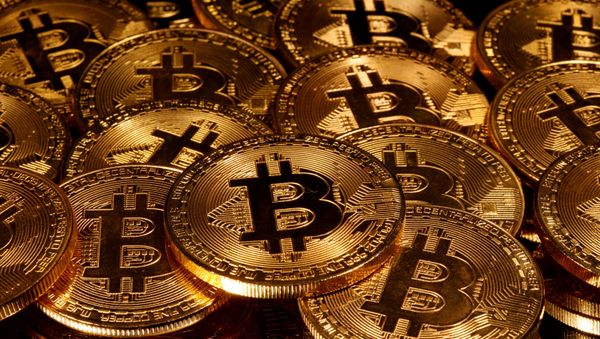 Representations of virtual currency Bitcoin are seen in this illustration taken taken 13 March 2020. - Sputnik International
