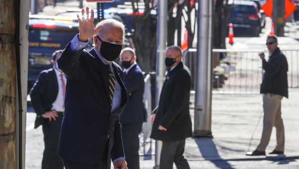 U.S. President-elect Joe Biden waves as he arrives at his transition headquarters in Wilmington, Delaware, U.S., December 28, 2020.   - Sputnik International