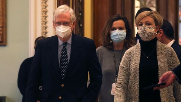 U.S. Senate Majority Leader Mitch McConnell leaves the Senate floor as the US Senate faces a decision over approving 2,000 dollars stimulus checks and overriding the President Trump's veto of the National Defense Authorization Act on Capitol Hill in Washington, U.S., December 29, 2020 - Sputnik International