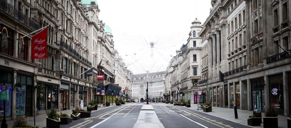 A view of a quiet Regent Street as shops remain closed under Tier 4 restrictions, amid the coronavirus disease (COVID-19) outbreak, in London, Britain, December 26, 2020 A view of a quiet Regent Street as shops remain closed under Tier 4 restrictions, amid the coronavirus disease (COVID-19) outbreak, in London, Britain, December 26, 2020 - Sputnik International