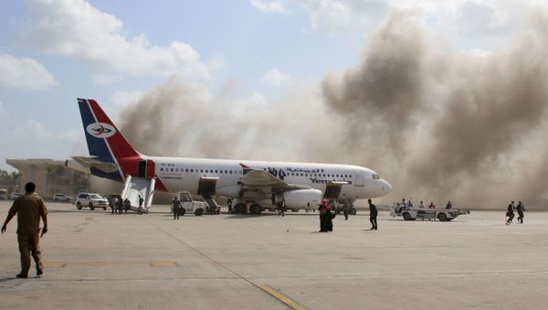 Dust rises after explosions hit Aden airport, upon the arrival of the newly-formed Yemeni government in Aden, Yemen December 30, 2020 - Sputnik International