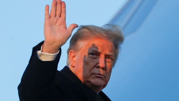 U.S. President Donald Trump waves as he boards Air Force One at Joint Base Andrews in Maryland, U.S., December 23, 2020 - Sputnik International