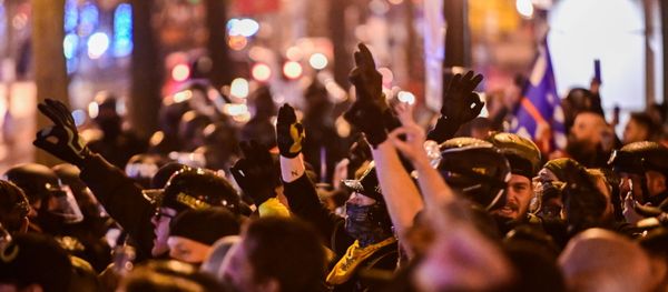 Members of the far-right group Proud Boys make 'OK' hand gestures indicating white power, as they gather near Black Lives Matter Plaza in Washington Members of the far-right group Proud Boys make 'OK' hand gestures indicating white power, as they gather near Black Lives Matter Plaza in Washington - Sputnik International