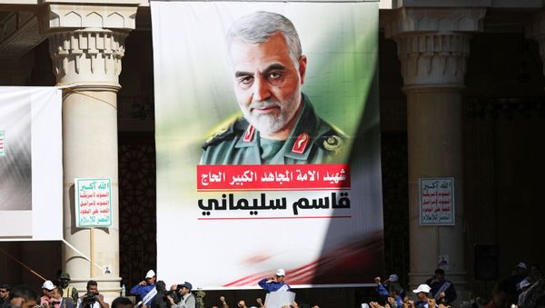 People attend a vigil marking the one year anniversary of the killing of Iranian military commander General Qassem Soleimani and Iraqi militia commander Abu Mahdi al-Muhandis in a U.S. drone attack, in Sanaa, Yemen January 2, 2021. People attend a vigil marking the one year anniversary of the killing of Iranian military commander General Qassem Soleimani and Iraqi militia commander Abu Mahdi al-Muhandis in a U.S. drone attack, in Sanaa, Yemen January 2, 2021. - Sputnik International
