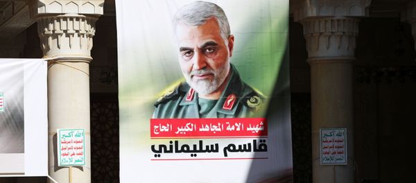 People attend a vigil marking the one year anniversary of the killing of Iranian military commander General Qassem Soleimani and Iraqi militia commander Abu Mahdi al-Muhandis in a U.S. drone attack, in Sanaa, Yemen January 2, 2021. People attend a vigil marking the one year anniversary of the killing of Iranian military commander General Qassem Soleimani and Iraqi militia commander Abu Mahdi al-Muhandis in a U.S. drone attack, in Sanaa, Yemen January 2, 2021. - Sputnik International