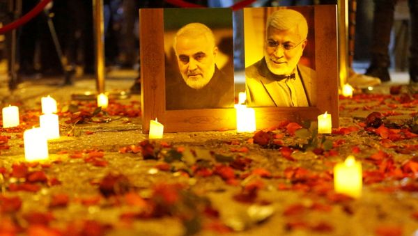Flowers are laid near pictures of senior Iranian military commander General Qassem Soleimani and Iraqi militia commander Abu Mahdi al-Muhandis on the first anniversary of their killings in a U.S. attack, in Baghdad, Iraq, January 2, 2021. Flowers are laid near pictures of senior Iranian military commander General Qassem Soleimani and Iraqi militia commander Abu Mahdi al-Muhandis on the first anniversary of their killings in a U.S. attack, in Baghdad, Iraq, January 2, 2021. - Sputnik International