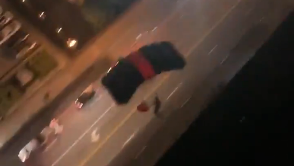 Two men BASE jumping from rooftop bar in Nashville, 1 January, 2021 - Sputnik International