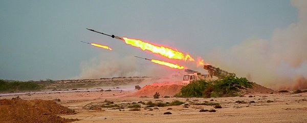 In this photo released Tuesday, July 28, 2020, by Sepahnews, missiles are fired in a Revolutionary Guard military exercise. Iran's paramilitary Revolutionary Guard fired a missile from a helicopter targeting the mock-up aircraft carrier in the strategic Strait of Hormuz. That's according to footage aired on state television on Tuesday. Iranian commandos also fast-roped down from a helicopter onto the replica in the footage from the exercise called Great Prophet 14. The drill appears aimed at threatening the U.S. amid tensions between Tehran and Washington. In this photo released Tuesday, July 28, 2020, by Sepahnews, missiles are fired in a Revolutionary Guard military exercise. Iran's paramilitary Revolutionary Guard fired a missile from a helicopter targeting the mock-up aircraft carrier in the strategic Strait of Hormuz. That's according to footage aired on state television on Tuesday. Iranian commandos also fast-roped down from a helicopter onto the replica in the footage from the exercise called Great Prophet 14. The drill appears aimed at threatening the U.S. amid tensions between Tehran and Washington. - Sputnik International