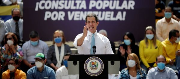 Opposition leader Juan Guaido speaks to the media during a news conference, the day before a popular consultation meant to reject December 6 parliamentary election in Caracas, Venezuela December 11, 2020. REUTERS/Manaure Quintero - Sputnik International