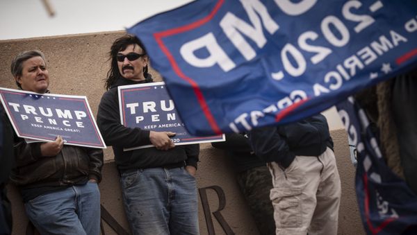Supporters of President Donald Trump stand outside of the Clark County Elections Department in North Las Vegas, Nev. Saturday, Nov. 7, 2020. - Sputnik International