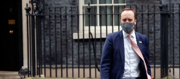 Britain's Health Secretary Matt Hancock leaves Downing Street, in London, Britain, January 4, 2021. Britain's Health Secretary Matt Hancock leaves Downing Street, in London, Britain, January 4, 2021. - Sputnik International