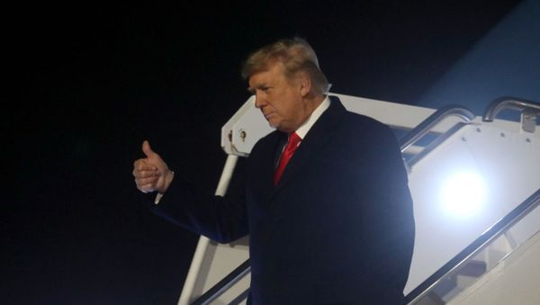 U.S. President Donald Trump leaves Air Force One upon arrival at Dobbins Air Reserve Base, Marietta, Georgia, as he makes his way to a campaign rally in Dalton, Georgia, U.S., on the eve of the run-off election to decide both of Georgia's Senate seats January 4, 2021. U.S. President Donald Trump leaves Air Force One upon arrival at Dobbins Air Reserve Base, Marietta, Georgia, as he makes his way to a campaign rally in Dalton, Georgia, U.S., on the eve of the run-off election to decide both of Georgia's Senate seats January 4, 2021. - Sputnik International