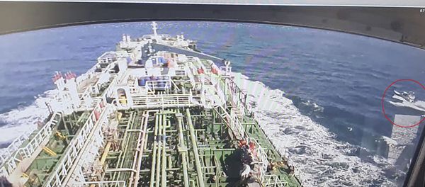 A CCTV footage of the Hankuk Chemi, a South Korean-flagged oil tanker, is displayed on a screen as a boat of Iran's Revolutionary Guards is seen in red circle on the screen at the tanker's owner company DM Shipping, in Busan on January 4, 2021. - South Korea's foreign ministry on January 4 demanded the early release of an oil tanker seized by Iran in Gulf waters for breaking maritime environmental laws. (Photo by - / YONHAP / AFP) / - South Korea OUT / REPUBLIC OF KOREA OUT  NO ARCHIVES  RESTRICTED TO SUBSCRIPTION USE - Sputnik International