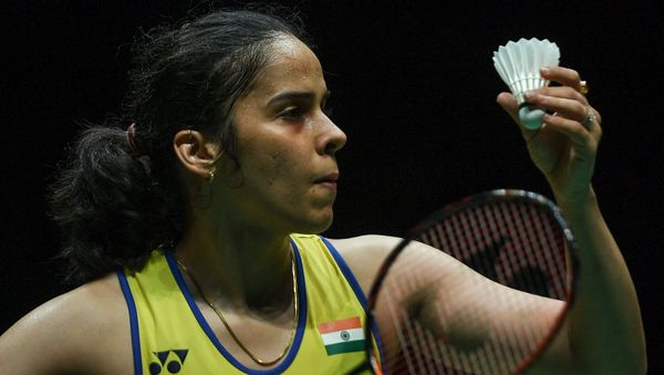 India's Saina Nehwal serves against Spain's Carolina Marin during their women singles quarter-final match at the Malaysia Open badminton tournament in Kuala Lumpur on January 10, 2020. - Sputnik International