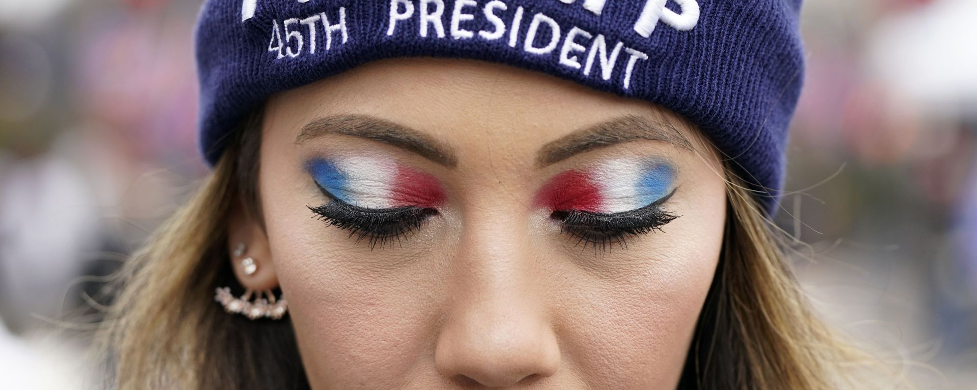 A person attends a rally at Freedom Plaza Tuesday, Jan. 5, 2021, in Washington, in support of President Donald Trump. A person attends a rally at Freedom Plaza Tuesday, Jan. 5, 2021, in Washington, in support of President Donald Trump. - Sputnik International, 1920, 13.01.2021