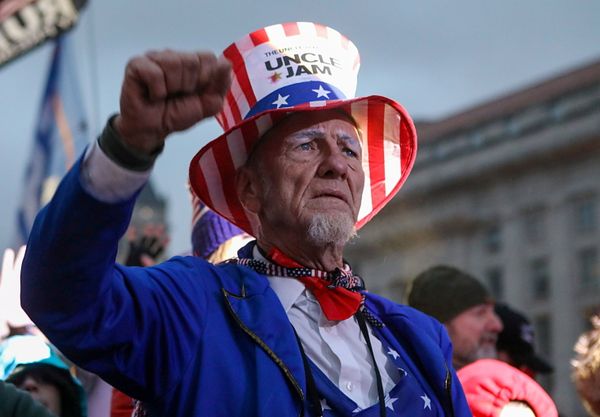A pro-Trump demonstrator reacts during a rally in Freedom Plaza, ahead of the U.S. Congress certification of the November 2020 election results, 5 January, 2021. A pro-Trump demonstrator reacts during a rally in Freedom Plaza, ahead of the U.S. Congress certification of the November 2020 election results, 5 January, 2021. - Sputnik International