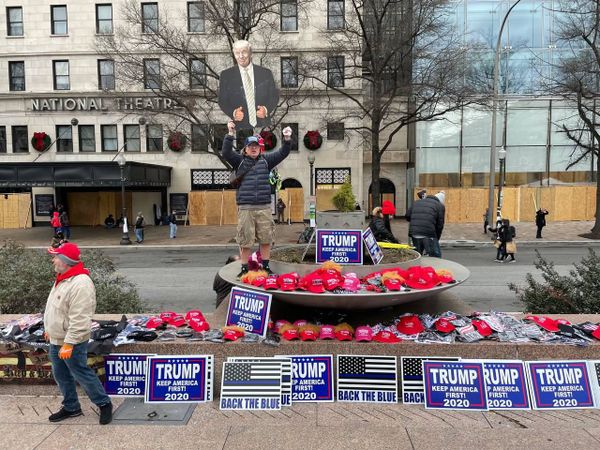A man gestures during a pro-Trump rally in Washington DC, as protesters demand a recount of votes in key battleground states in the 3 November presidential election. A man gestures during a pro-Trump rally in Washington DC, as protesters demand a recount of votes in key battleground states in the 3 November presidential election. - Sputnik International