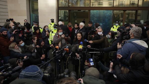 Stella Moris girlfriend of Julian Assange, at center, speaks to the media outside the Westminster Magistrates Court after Assange was denied bail at a hearing in the court, in London, Wednesday, Jan. 6, 2021. On Monday Judge Vanessa Baraitser ruled that Julian Assange cannot be extradited to the US. because of concerns about his mental health. Assange had been charged under the US's 1917 Espionage Act for unlawfully obtaining and disclosing classified documents related to the national defence. Assange is still in custody. (AP Photo/Matt Dunham) - Sputnik International