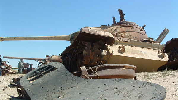 A shoe sole and rusting tanks lie along the Highway of Death in 2003 A shoe sole and rusting tanks lie along the Highway of Death in 2003 - Sputnik International