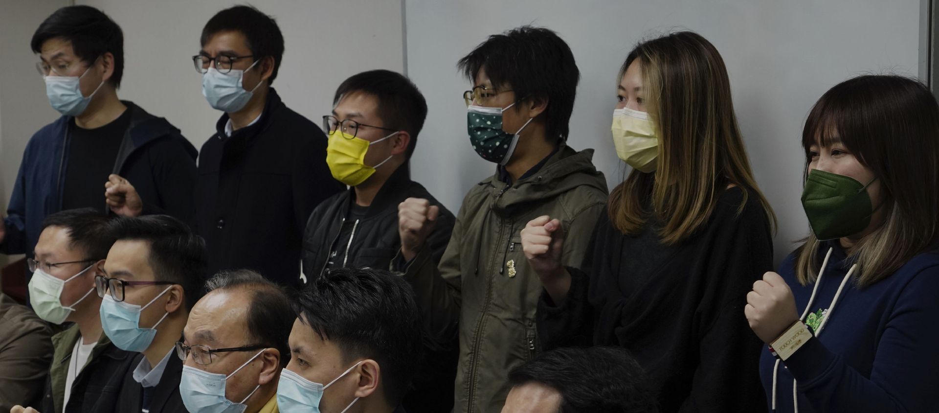 Pro-democratic party members shout slogans in response to the mass arrests during a press conference in Hong Kong Wednesday, Jan. 6, 2021. About 50 Hong Kong pro-democracy figures were arrested by police on Wednesday under a national security law, following their involvement in an unofficial primary election last year held to increase their chances of controlling the legislature, according to local media reports. Pro-democratic party members shout slogans in response to the mass arrests during a press conference in Hong Kong Wednesday, Jan. 6, 2021. About 50 Hong Kong pro-democracy figures were arrested by police on Wednesday under a national security law, following their involvement in an unofficial primary election last year held to increase their chances of controlling the legislature, according to local media reports. - Sputnik International, 1920, 06.01.2021