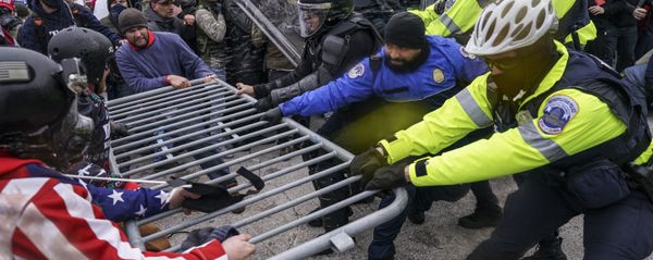 Trump supporters try to break through a police barrier, Wednesday, Jan. 6, 2021, at the Capitol in Washington Trump supporters try to break through a police barrier, Wednesday, Jan. 6, 2021, at the Capitol in Washington - Sputnik International