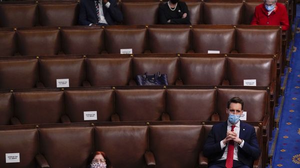 Republican Senator Josh Hawley of Missouri listens as a joint session of the House and Senate reconvenes to confirm the Electoral College votes at the Capitol, Wednesday, 6 January 2021. - Sputnik International