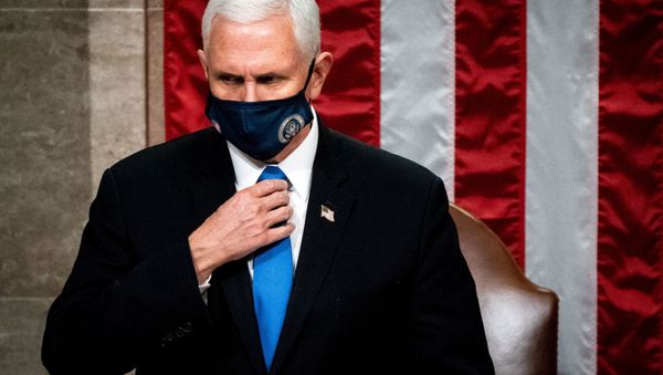 Vice President Mike Pence presides over a Joint session of Congress to certify the 2020 Electoral College results after supporters of President Donald Trump stormed the Capitol earlier in the day, on Capitol Hill in Washington, U.S. January 6, 2021. Erin Schaff/Pool via REUTERS - Sputnik International